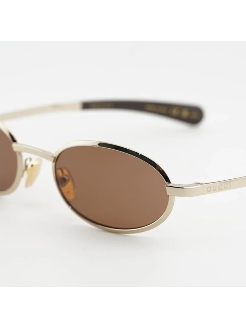 Gucci GG1942S 003 Women Sunglasses Gold Oval Frame, Brown Lenses